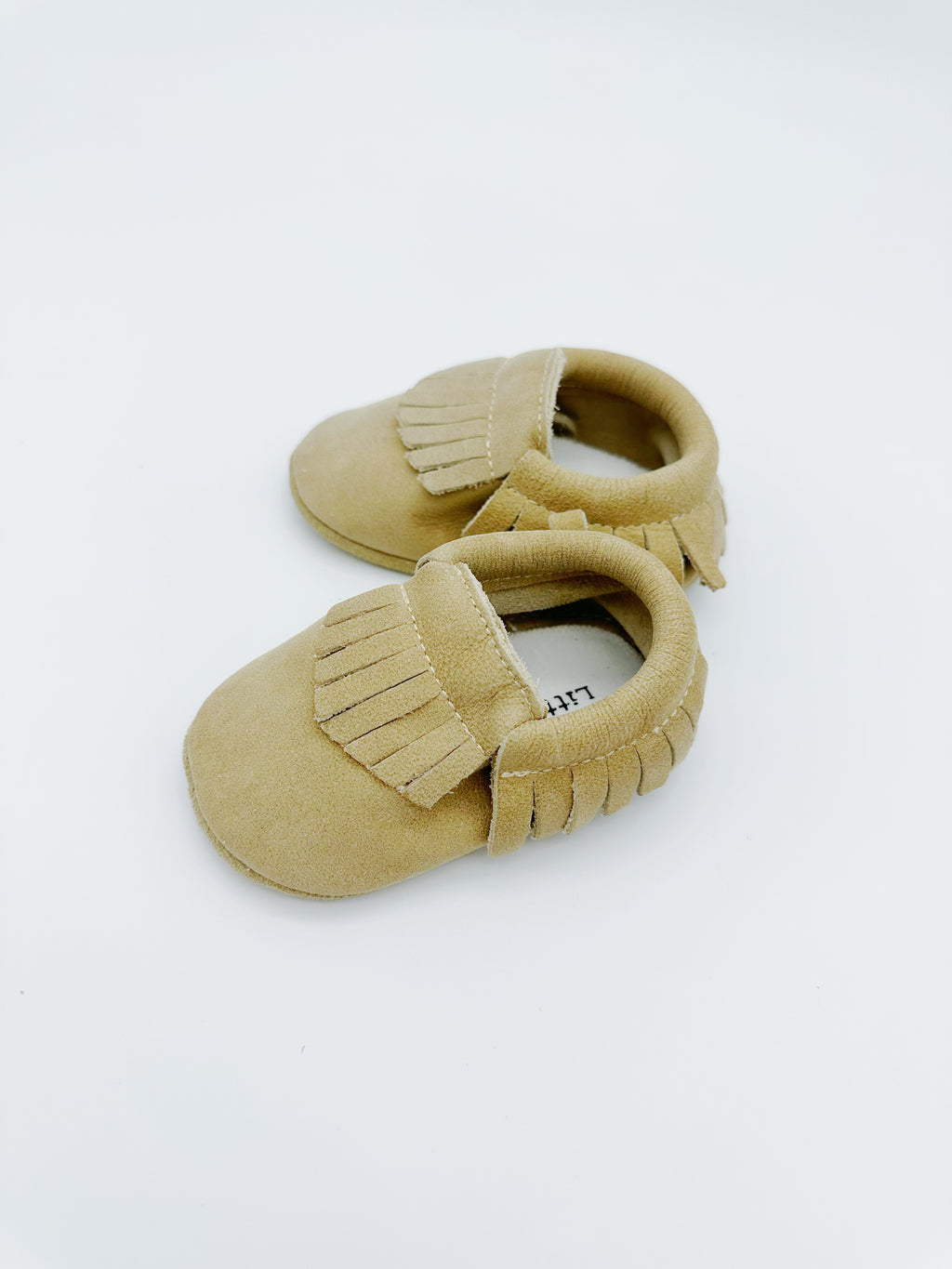 Fringe Beige Baby Leather Flat Shoes