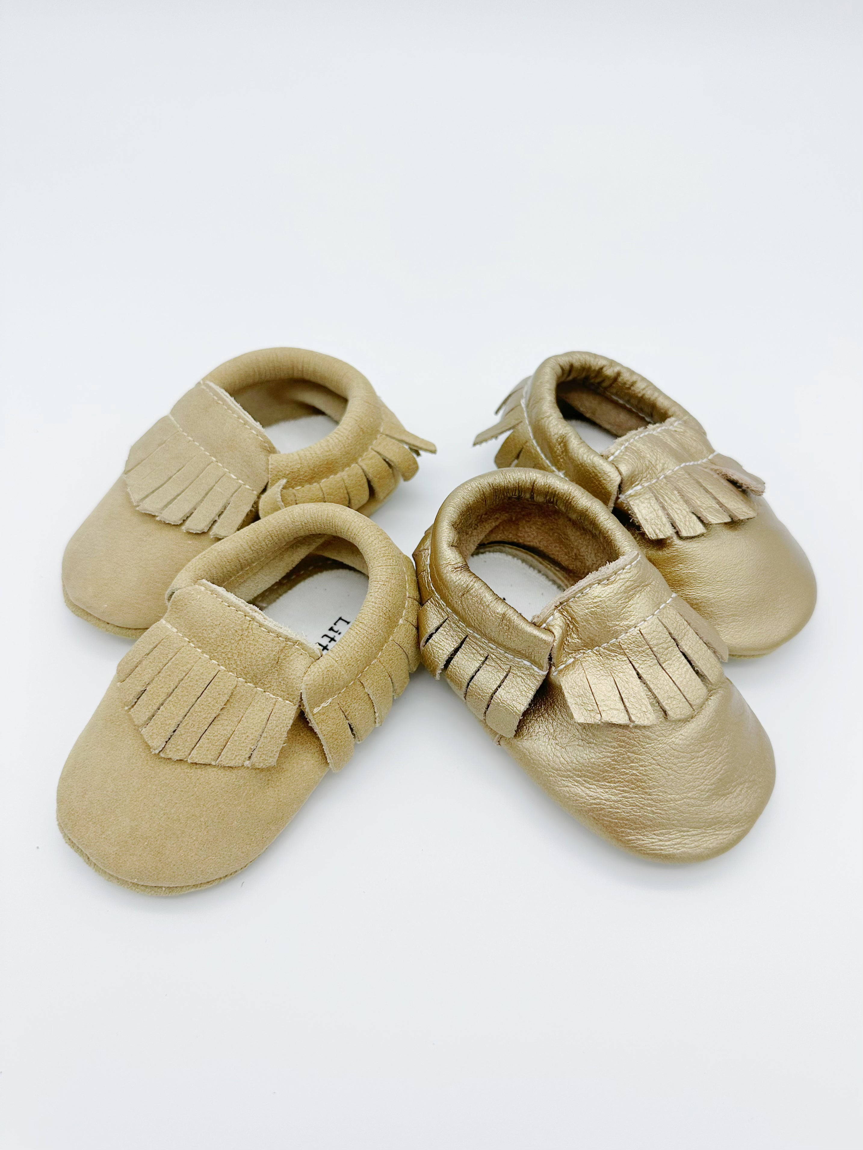 Fringe Beige Baby Leather Flat Shoes